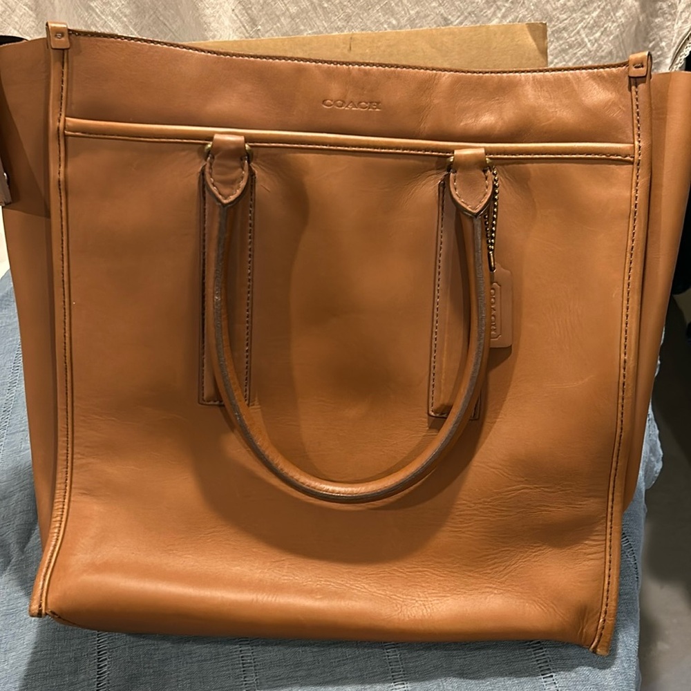 Coach tan leather bag. Great for work or travel. Unisex.